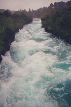The roaring Waikato river before it transforms into a stunning waterfall, Huka Falls, eventually leading into Lauke Taupo.