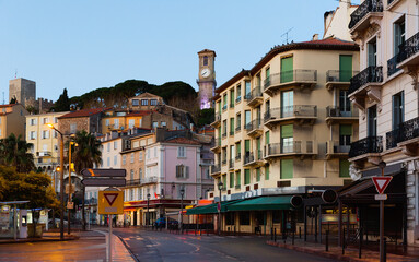 Fototapeta na wymiar Picture of Cannes french riviera historical streets and building in evening..