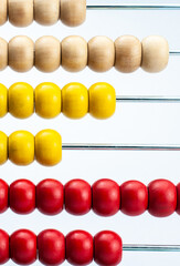 close-up of the wooden beads of an abacus