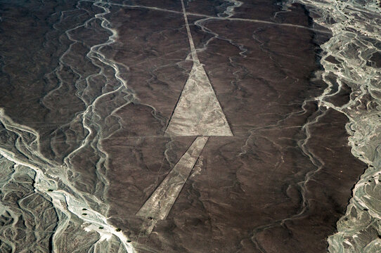 A Nasca line design formed in to the desert surface