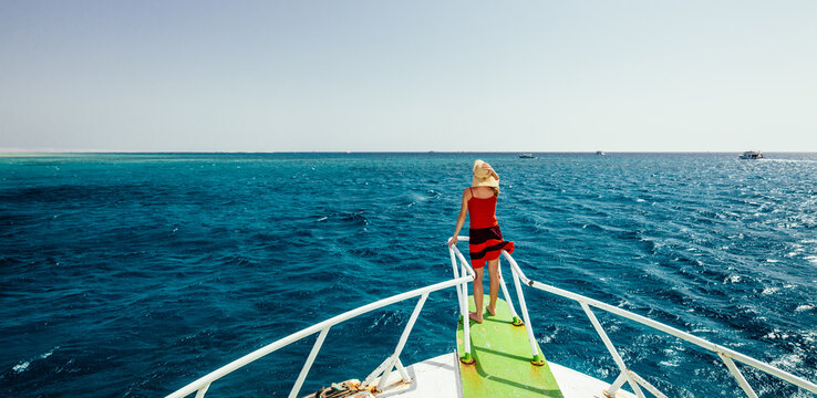 Young woman sailing on ship