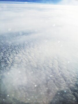 Ice on Airplane Window from Sky