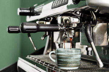 Professional coffee machine in coffee shop close up