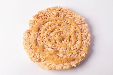 Thai Sweet Crispy Rice Cakes with Cane Sugar Drizzle on white background