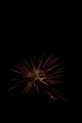 Obraz premium 4th of July and new year Fireworks in the night sky. Firework concept background.