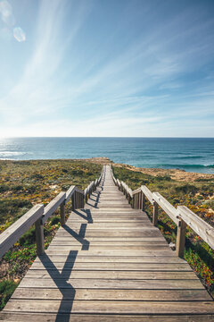 wooden stairs leading to the beach of the atlantic ocean