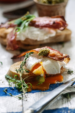 Poached eggs and maple bacon breakfast.