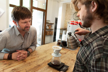 Male Barista Preparing Gourmet Filter Coffee