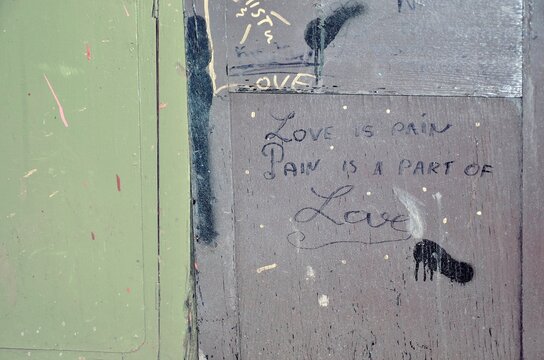 Love note on wooden old grungy door