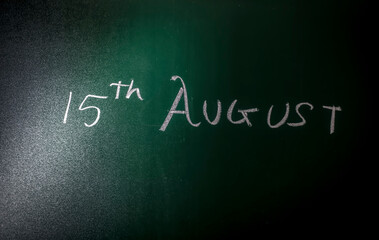 Happy Independence Day 15 August written on a blackboard with chalk for independence day celebration.