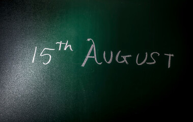 Fototapeta premium Happy Independence Day 15 August written on a blackboard with chalk for independence day celebration.