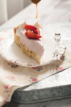 Slice of pineapple clafoutis with strawberry mousse