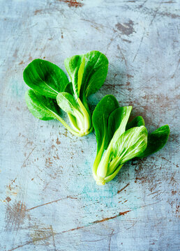 Two heads of baby bok choy