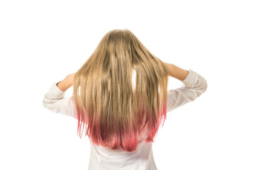 Girl straightens her loose hair isolated on a white background.