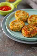 Vegetable cutlets in a plate on the table. Top view. Healthy diet