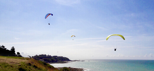 Sport paragliding on the beach Granville Normandie France
