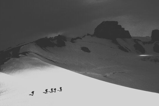 Climbers crossing glacier