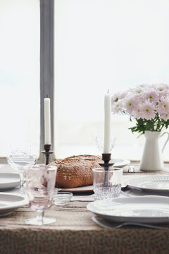 Rustic table settings by the window