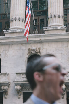 Bearish Market Photo of Trader Yawning in front of Stock Exchange in New York
