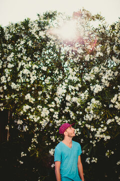 Handsome stylish man getting in touch with his inner flower child