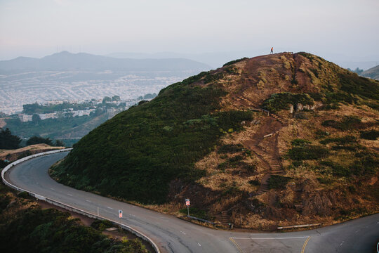A young man climbs to the top
