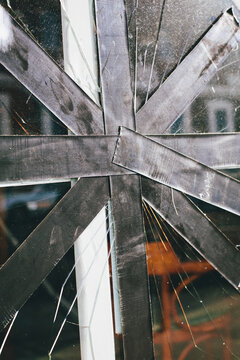 Broken glass repaired with electrical tape, close up