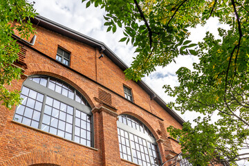 old red brick building with large Windows