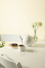 Concept of breakfast with blueberry pie on white table