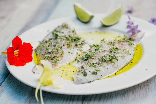 Food: Raw seam bream filet in lemon balm marinade