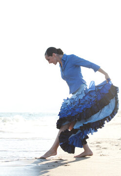 Flamenco dancer on Barcelona beach. Spain.