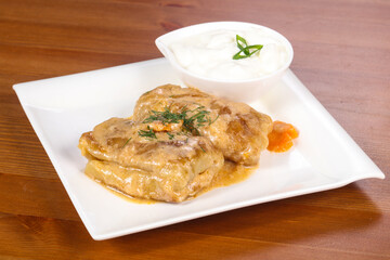 Homemade stuffed cabbage with cream