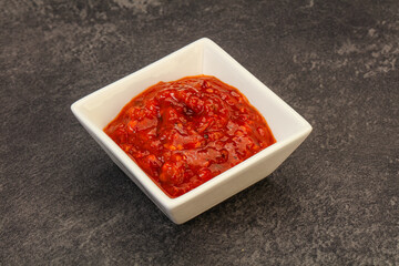 Tomato spicy sauce in the bowl