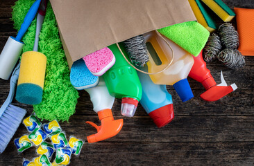 Detergent bottles in the brown paper shopping bag