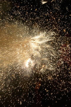Rain of fire and sparks in a popular celebration
