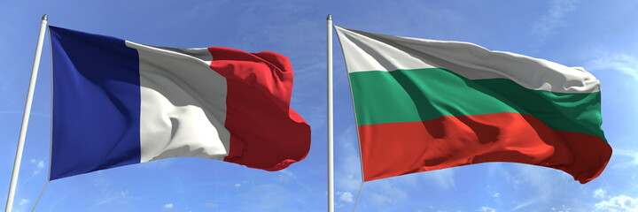 Flags of France and Bulgaria on flagpoles. 3d rendering