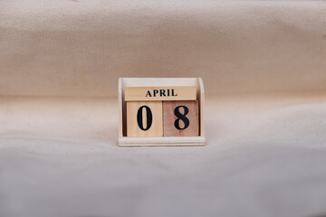 May 8th. Image of May 8 wooden color calendar on white canvas background. empty space for text