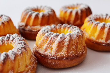 Cheese muffins on a white background.