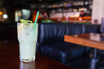cocktail on the table at a cafe blurred background