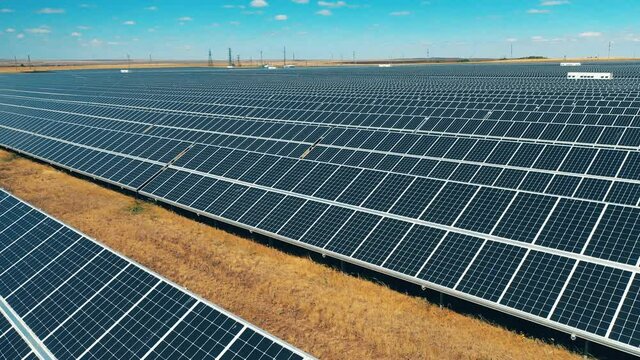 Solar power farm with plenty of solar panels. Modern solar panels, ecological friendly energy production.