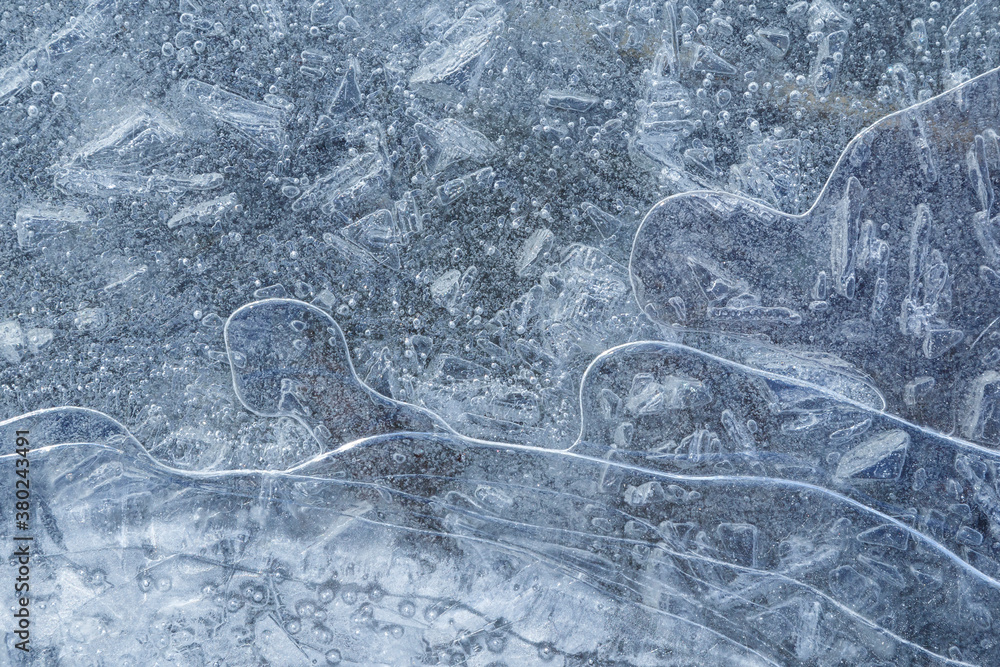 Poster macro close-up of ice on a frozen lake in the winter, viewed from above. abstract full frame texture