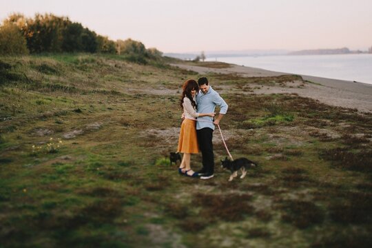 Cute couple with their dogs