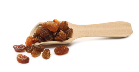Raisins in wooden spoon isolated on white background