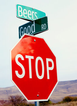 Road signs coming together for a funny phrase