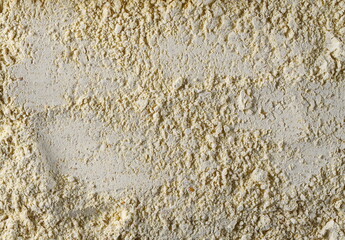 Chickpea flour pile background and texture