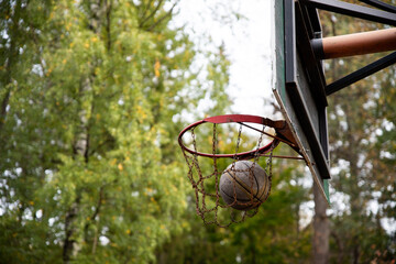 Streetball, street game, ball in the basket