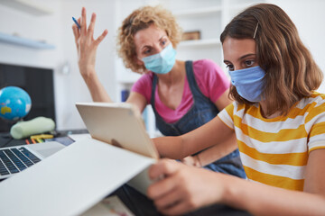 Getting crazy with child home studying education, homeschooling, with private tutor / mother with...