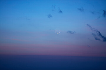Young Moon setting on a evening sky. My astronomy work.