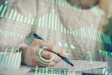 Tech theme hologram over woman's hands taking notes background. Concept of hightech. Double exposure