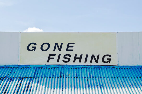 Big public sign/display message that reads gone fishing