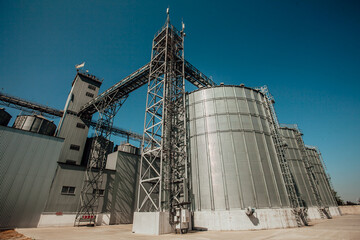 Obraz premium Elevator. The modern agricultural enterprise. Grain processing. Storage of grain